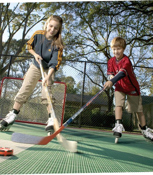 Children playing roller hockey