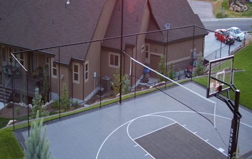 Basketball court with fences for containment