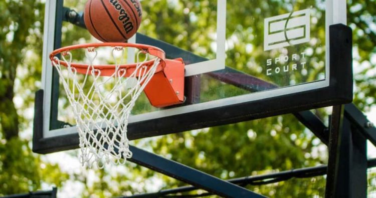 Basketball going into hoop